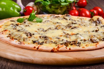 Thin pizza with mushrooms and cheese