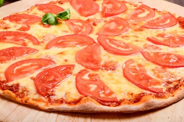 Thin pizza with tomatoes Margarita