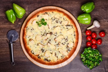 Pizza with chicken and fried mushrooms with cheese