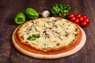 Pizza with chicken and fried mushrooms with cheese