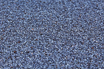 Poppy seeds as background.