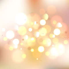 Gold glitter bokeh lights background. Defocused vector illustration