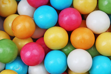Fototapeta na wymiar Bubble gum texture. Colorful candies. Chewing gum bubblegum wallpaper background.