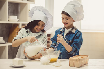 Children baking in kitchen