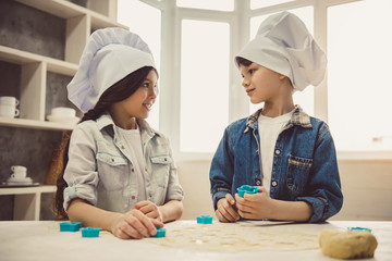Children baking in kitchen