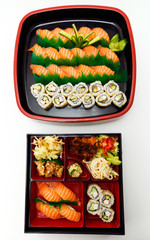 Sushi set roll served in traditional Japan wooden plate.