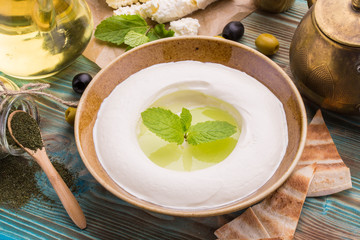 Traditional house cottage cheese with garlic and mint, with addition of olive oil