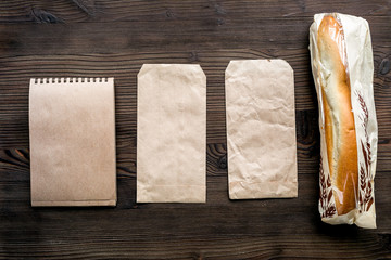 food delivery with paper bags and sandwich top view space for text