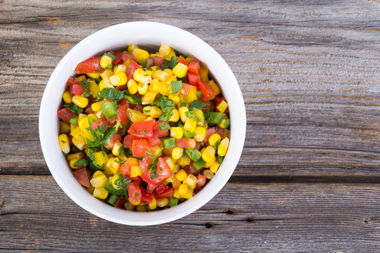 Corn Salsa Salad Bowl On Rustic Table