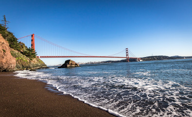 Beach view of Golden Gate Bridge and city Skyline - San Francisco, California, USA