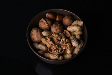 Different types of nuts are in a plate