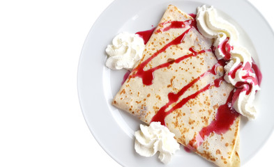 Sweet pancake with cherry syrup