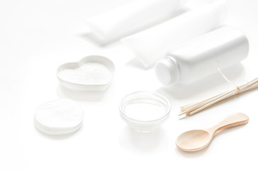 white cosmetic set on desk background