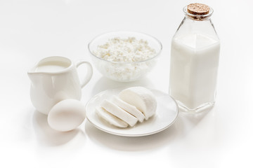 Fresh dairy products on white desk background