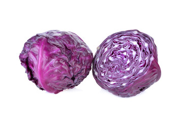 Fototapeta premium whole and cut fresh red cabbage on white background