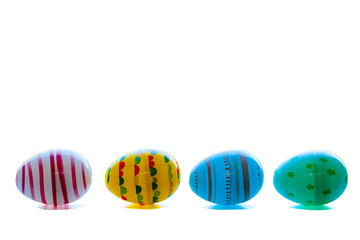 Colorful Easter eggs in a row, isolated on white.
