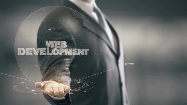 Web Development with hologram businessman concept