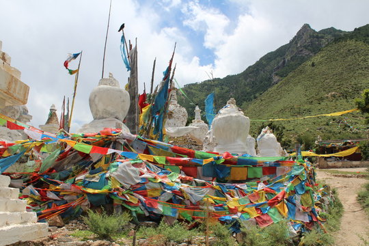 Amdo Kham Tibet Tibetan Buddhist Chorton Religious Structure Structures White Religion Buddha Buddhism China Sichuan Plateau Prayer Flag Flags Blue Sky White Cloud Clouds