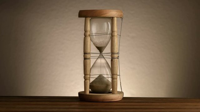 Time lapse of vintage wooden hourglass 
