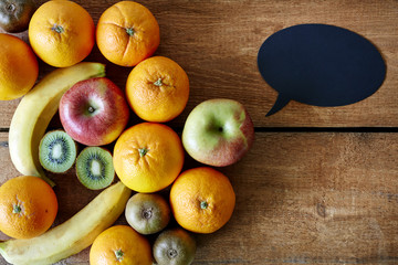 arrangement of fresh fruit with speech bubble