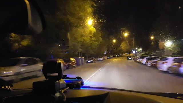 Pictures from inside a police car. "Real sound of sirens"