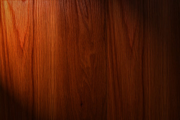 Obraz premium Dark brown wood background with light