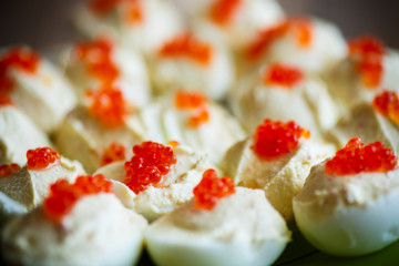 Eggs stuffed red caviar
