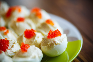 Eggs stuffed red caviar