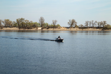Fototapeta na wymiar police boat on the river in motion
