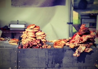 street food stall with grilled sausages with vintage effect