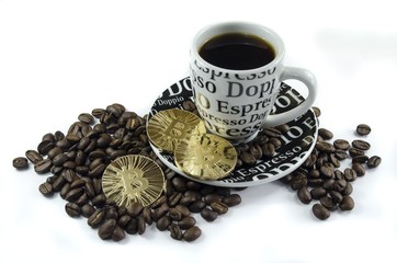 Coffee beans, cup and bitcoin coins laying on white background