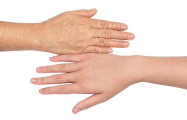 Teenage hand and elderly  hand isolate on white