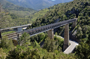Automobile and railway bridge in the Corsican mountains