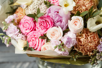 Vintage dark grunge wood texture with empty space decorating by old rose and mixed flowers sweet romantic concept