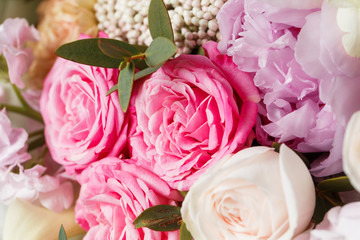 Vintage dark grunge wood texture with empty space decorating by old rose and mixed flowers sweet romantic concept