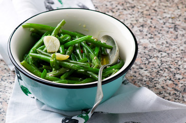 braised green beans with garlic. selective focus