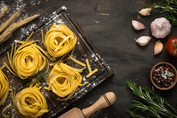 Italian raw homemade pasta tagliatelle.