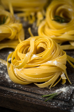 Italian raw homemade pasta tagliatelle.