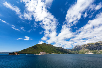 Wide angle view of the Our Lady of the Rock and the Sveti Dordje churches on neighboring islands in the Bay of Kotor, Montenegro.