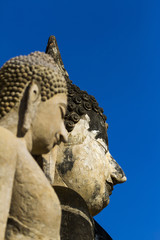 Fototapeta premium Face statue buddha and blue sky