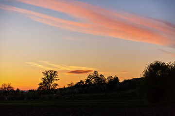 Fototapeta na wymiar beautiful sky sunset over a hill