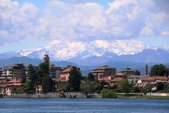 Sesto Calende and Alps panoramic view from the River Ticino, Italy