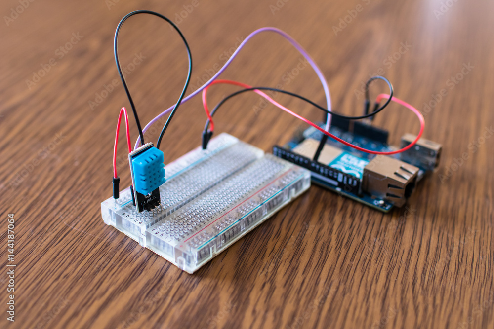 Poster humidity and temperature sensor prototype at school for iot device. weather box iot diy in education