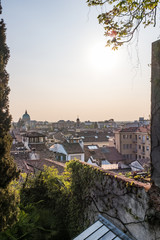 Fototapeta na wymiar View top of the roofs to city Udine