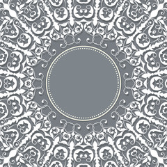 Wedding invitation and announcement card with ornamental round lace with arabesque elements. Mehndi style. Orient traditional ornament. Zentangle-like round colored floral ornament.