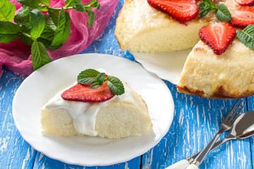 Cottage cheese casserole with coconut, decorated with strawberries and mint