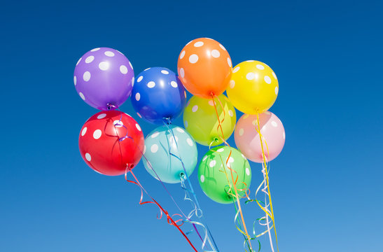 Balloons against the blue sky