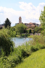 Fototapeta na wymiar View to church tower in Sesto Calende on river Ticino, Italy