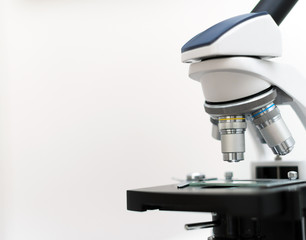 Close-up view of microscope in the laboratory. Space for your text.