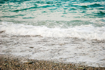 Turquoise waters, fine sand and small waves lapping at the shore